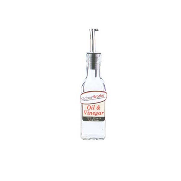 BOTTLE OF OLIVE OIL WITH CHERRY
